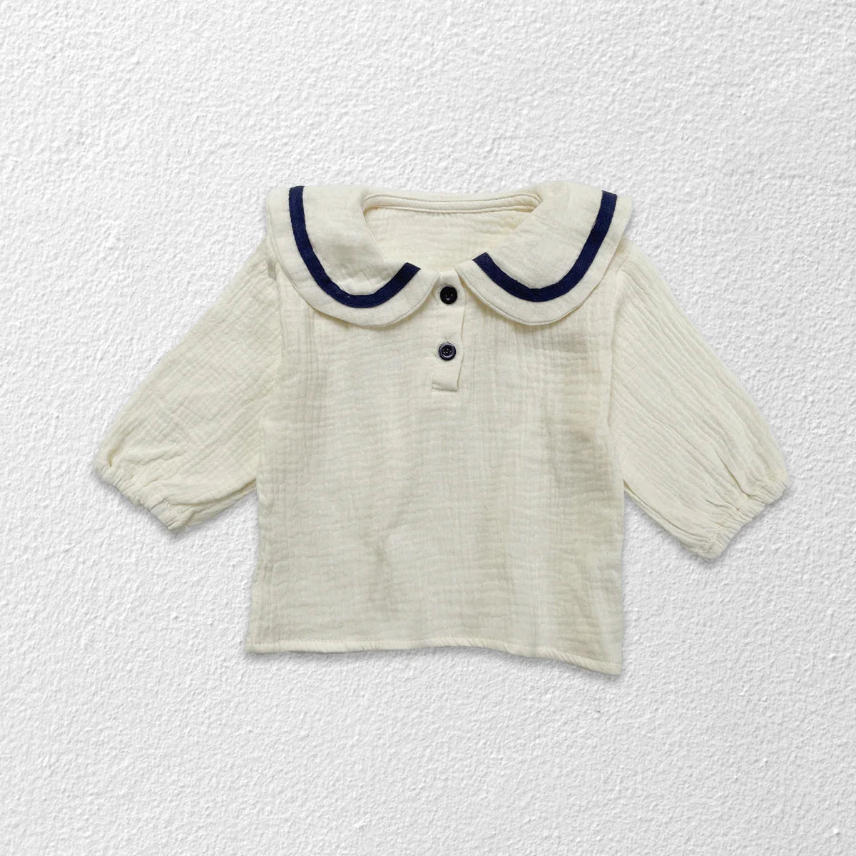 Newborn baby autumn set hanging, displaying unisex design and soft cotton material.