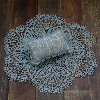 Elegant lace baby blanket and pillow ensemble for a memorable photoshoot