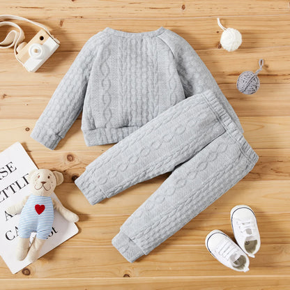 Baby's long-sleeved shirt and pants combo, ideal for cozy baby wear in autumn-spring seasons