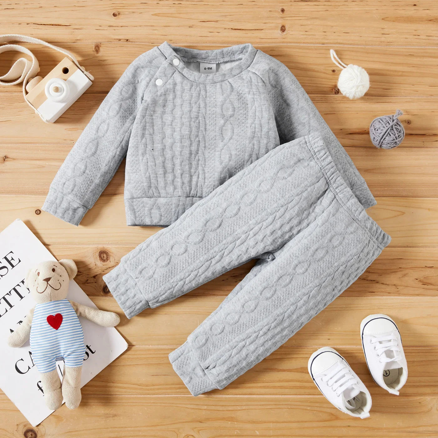 Cozy baby wear: long-sleeved shirt and pants set in a comfortable cotton blend for infants