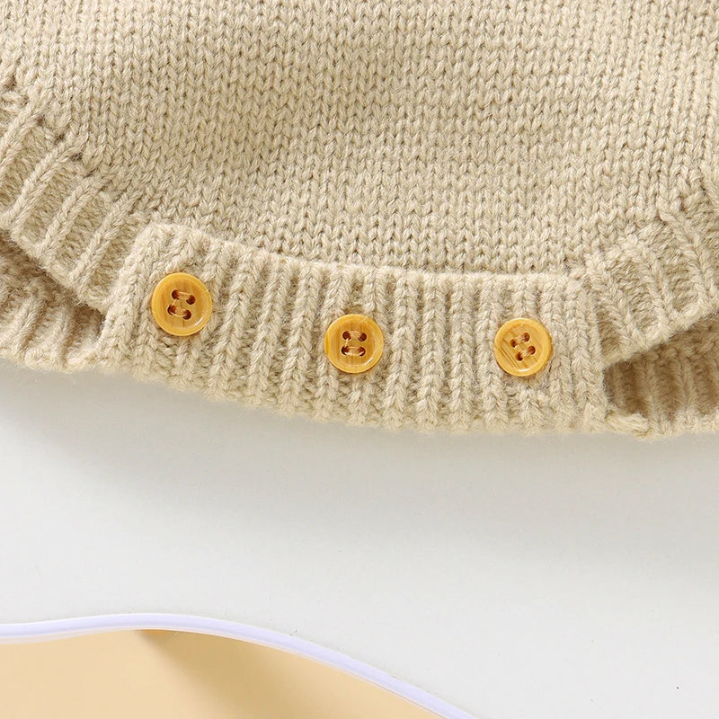 Solid white sleeveless newborn bodysuit with accompanying hat, essential baby gift set