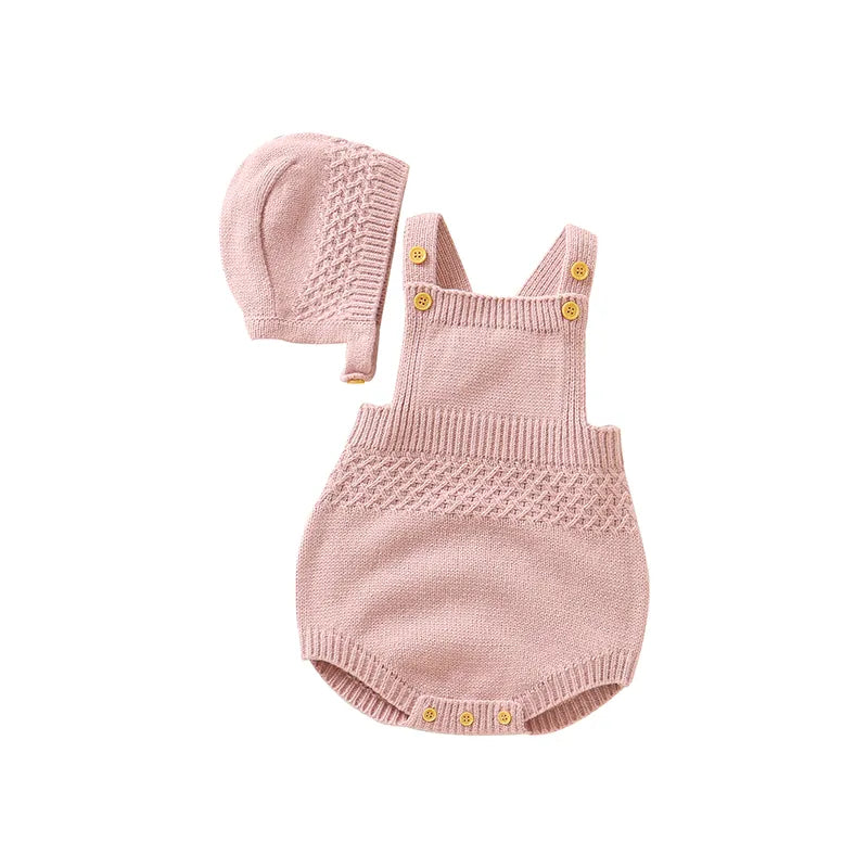 Detailed view of the button snaps on a sleeveless baby bodysuit, high-quality acrylic, easy diaper changes