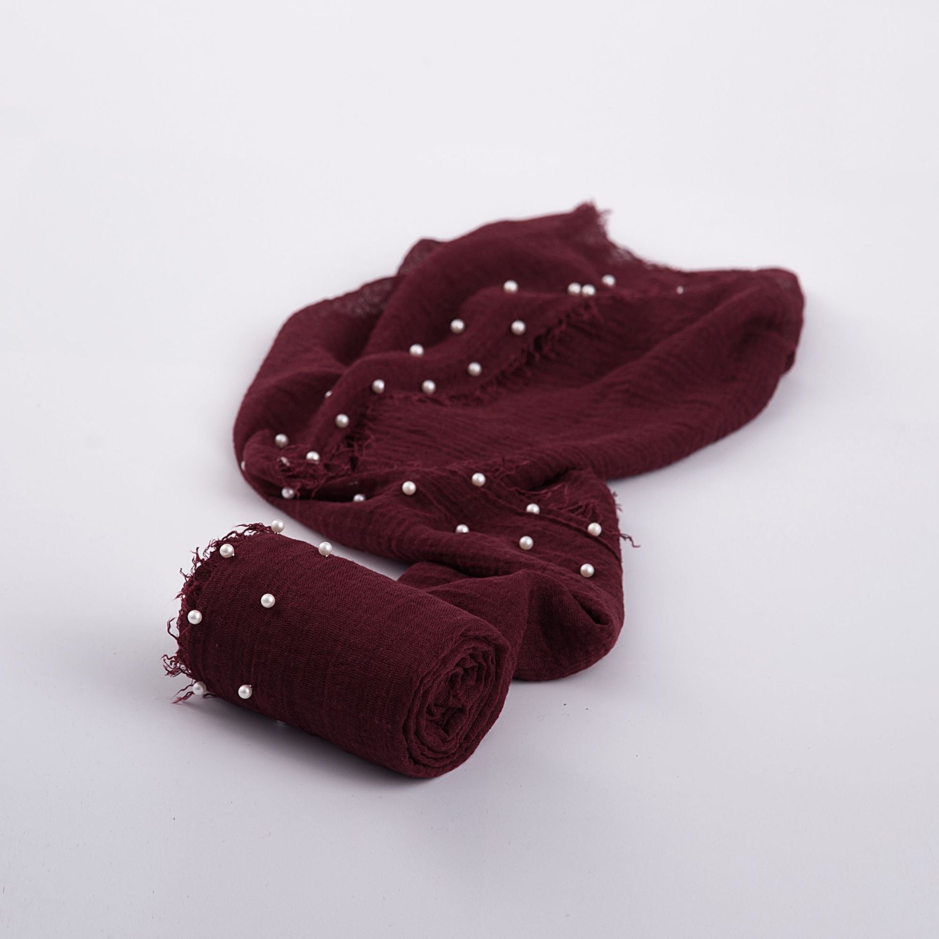 Charming baby swaddle wrap blanket with small white beads, infant comfort item