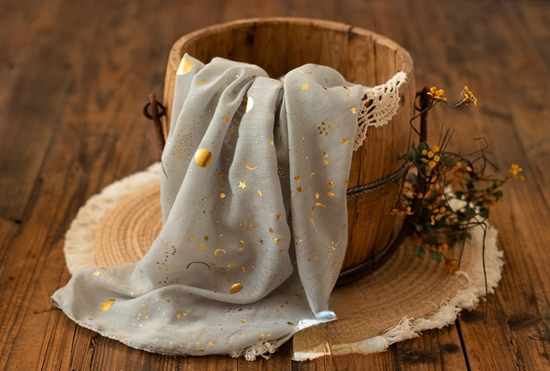 Newborn baby swaddle wrap with soft cotton, star & moon print for gentle comfort.