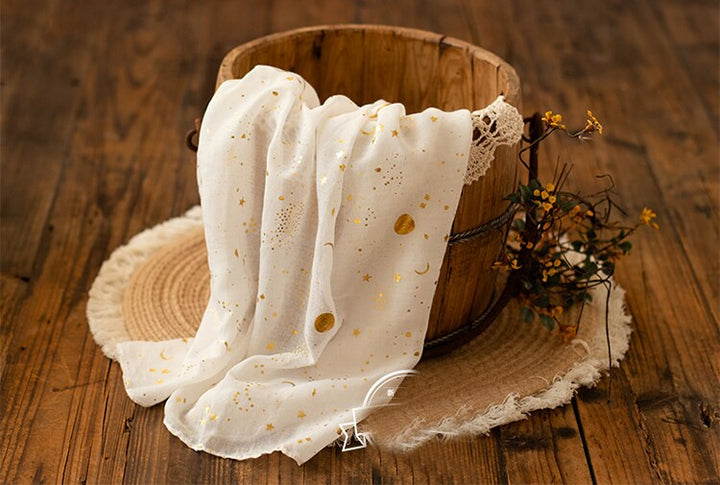 Thoughtful baby gift: a soft cotton newborn swaddle wrap with cute star & moon print for infants.