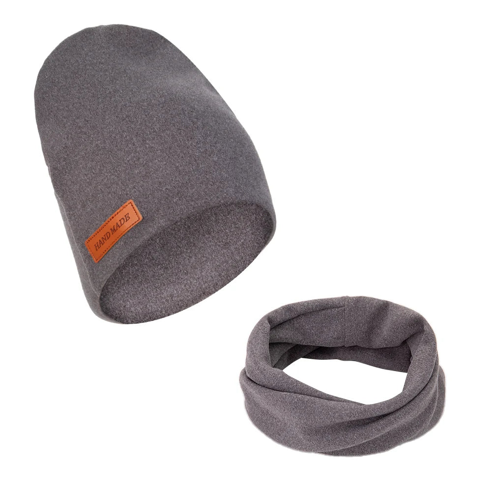 Infant wearing a soft blue turban hat and scarf, showcasing cozy baby comfort.