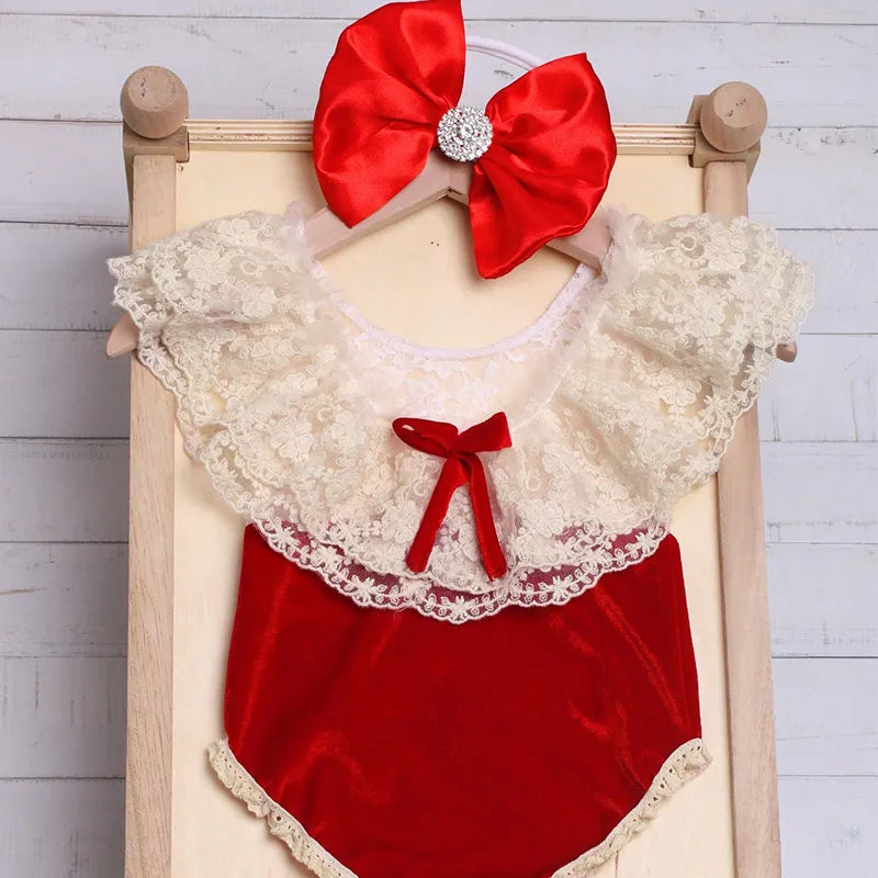 Close-up of a red rhinestone baby headband, ideal for newborn photography and infant photo shoots
