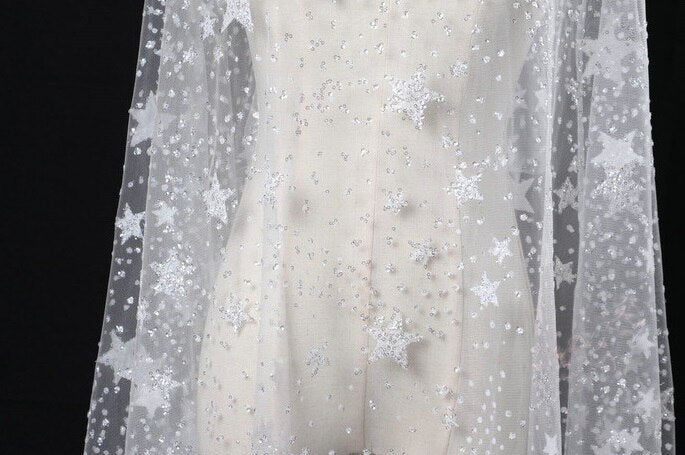 Close-up of glitter star blanket for newborn photo shoot backdrop, baby accessory, infant prop