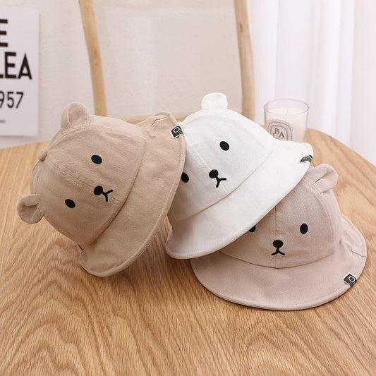 Newborn bear sun protection bucket hat made of soft cotton, perfect for summer.