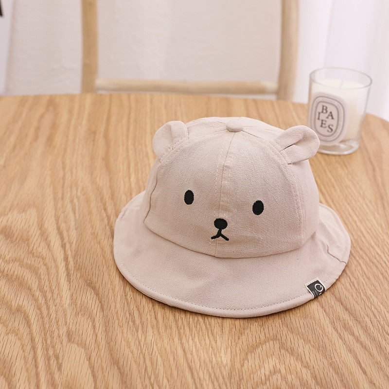 Sweet newborn summer hat, featuring a playful bear design and sun protection.