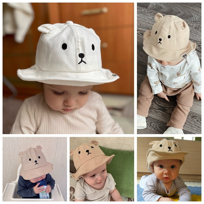 Breathable infant sun hat with bear ears, keeping baby cool and protected.