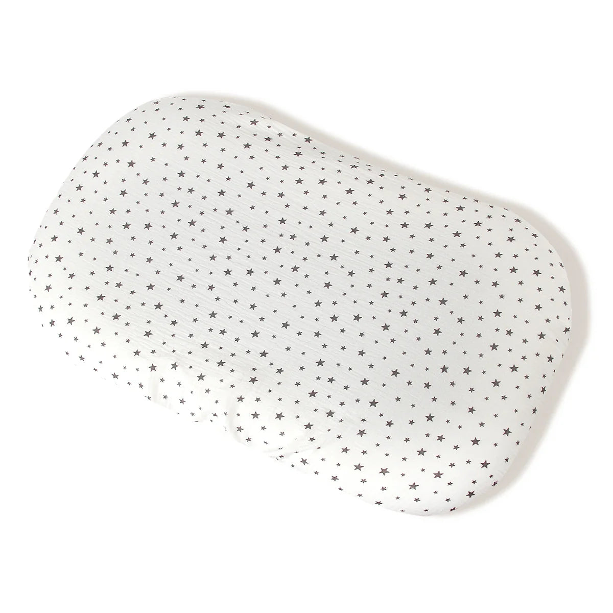 Newborn cartoon fitted crib sheet on a crib mattress, highlighting the snug fit and soft breathable material