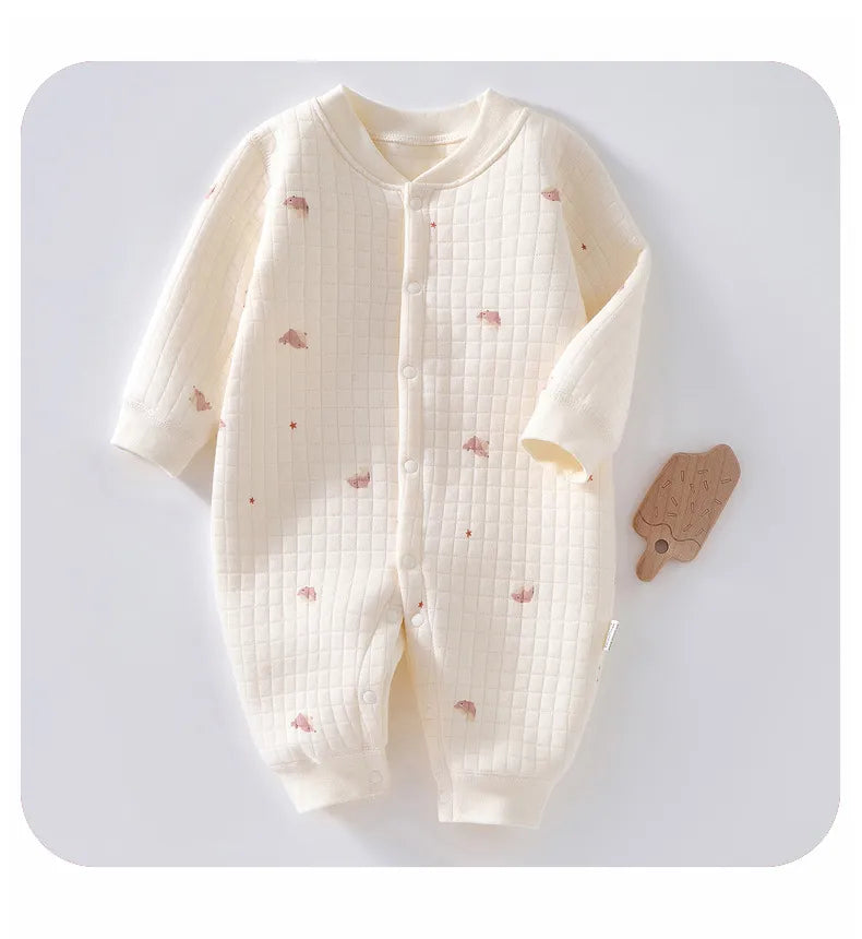 Infant in a unisex bunny cartoon cotton romper, perfect for everyday wear