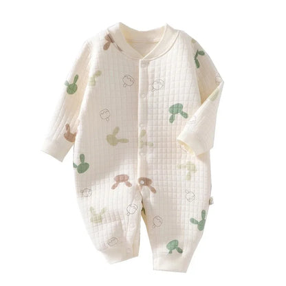 Front detail of newborn cotton romper illustrating cartoon bear face, quality baby apparel