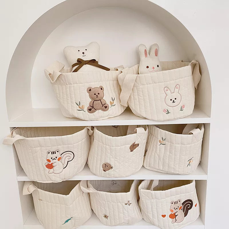Newborn Diaper Caddy: Portable nursery organizer for baby essentials & changing station.