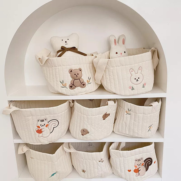 Newborn Diaper Caddy: Portable nursery organizer for baby essentials & changing station.