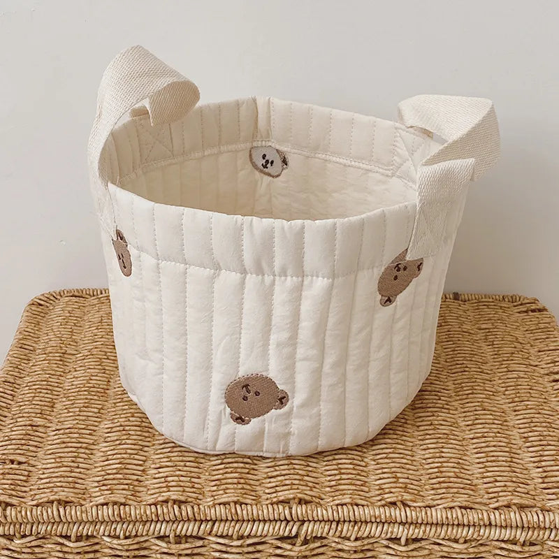 Portable nursery storage caddy; a convenient baby room organizer.