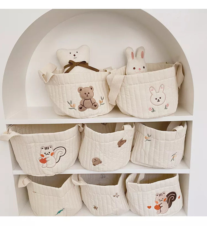 Olive print diaper caddy: Stylish baby organizer & changing station storage.