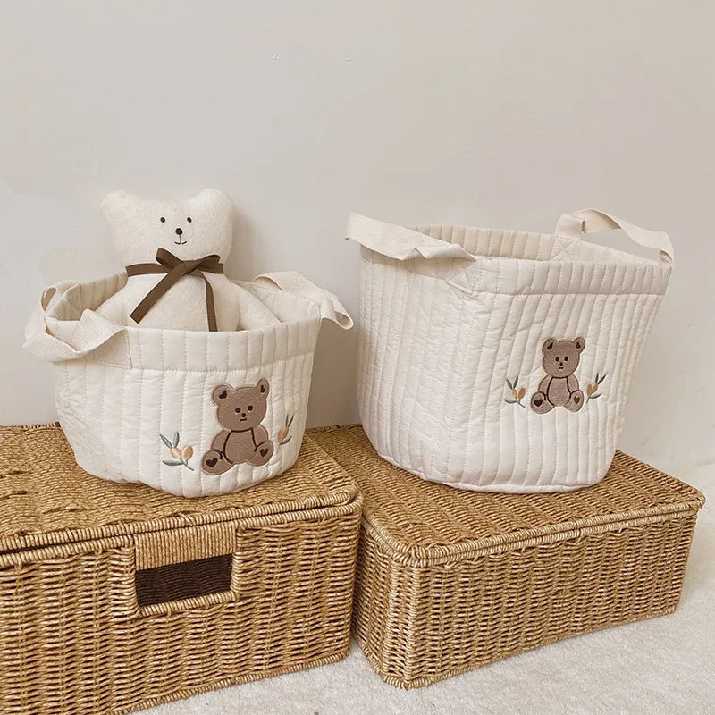 Cotton Diaper Caddy with modern olive print; ideal baby storage for nursery.