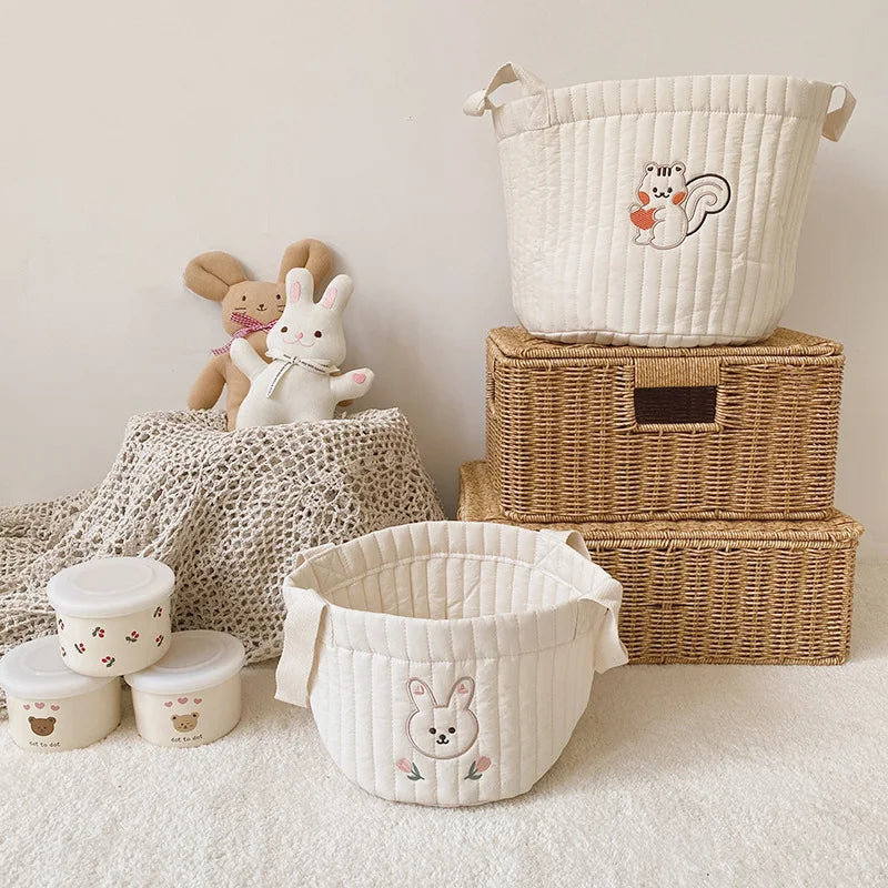 Stylish baby storage bag with cute rabbit print; perfect newborn essentials organizer.