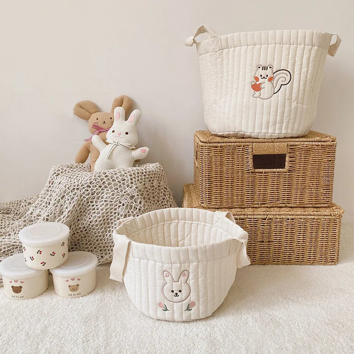 Stylish baby storage bag with cute rabbit print; perfect newborn essentials organizer.