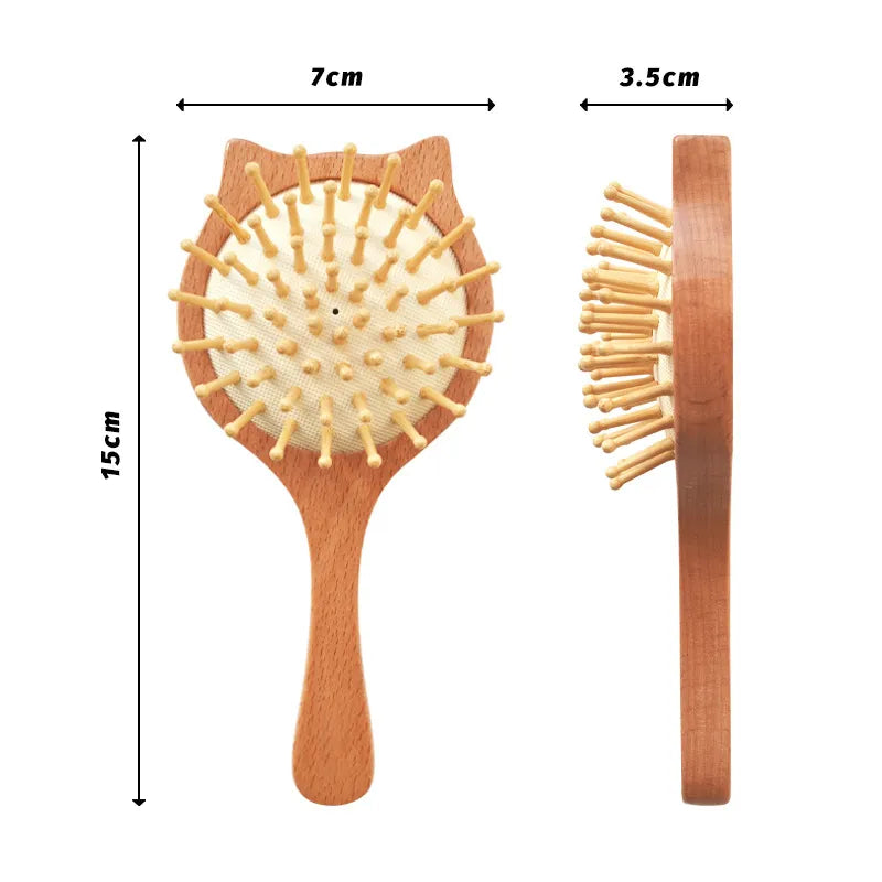 Close-up of the gentle wooden comb included in the newborn baby hair brush set