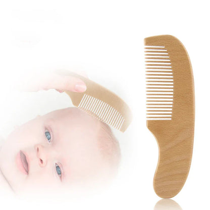 Infant scalp brush made with natural wool and a smooth wooden handle for comfort