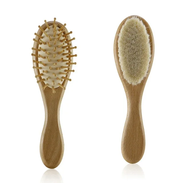 Natural wool bristle baby brush with wooden handle, perfect for soothing newborn scalp