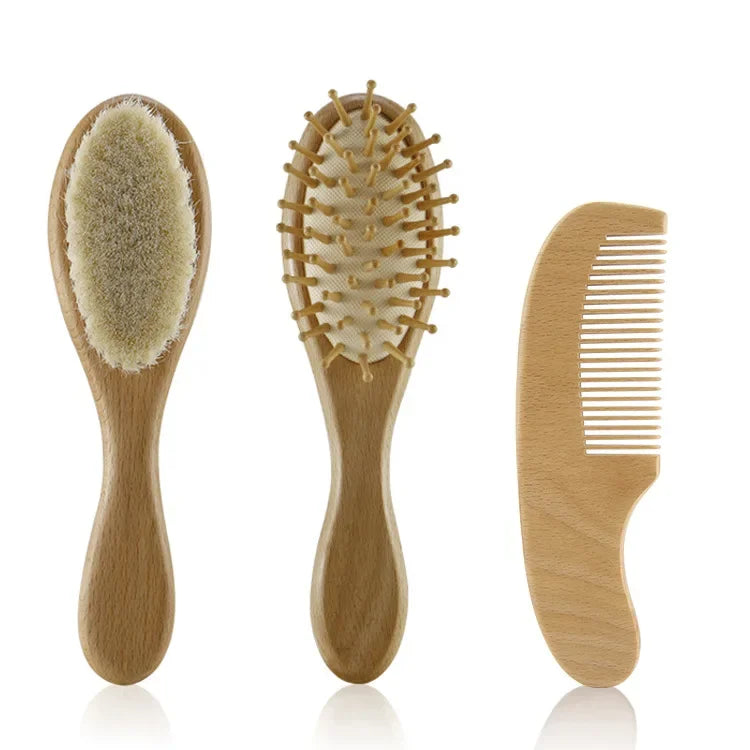 Complete newborn hair care set featuring a wooden comb and wool bristle brush