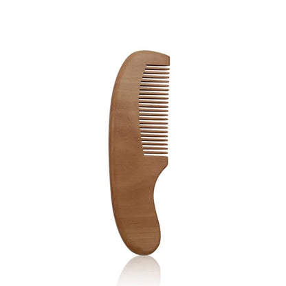 Gentle grooming tool: wooden baby brush with extra-soft wool, displayed on a clean surface