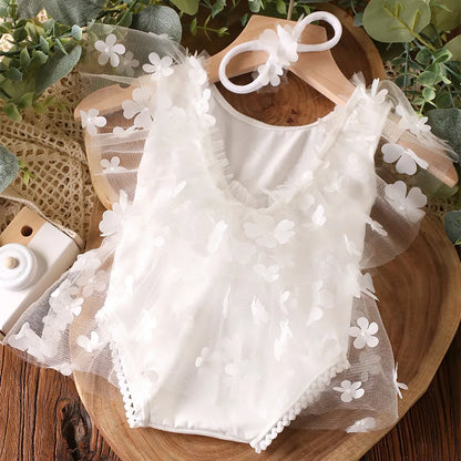 Textured image of the soft polyester fabric of the newborn floral romper