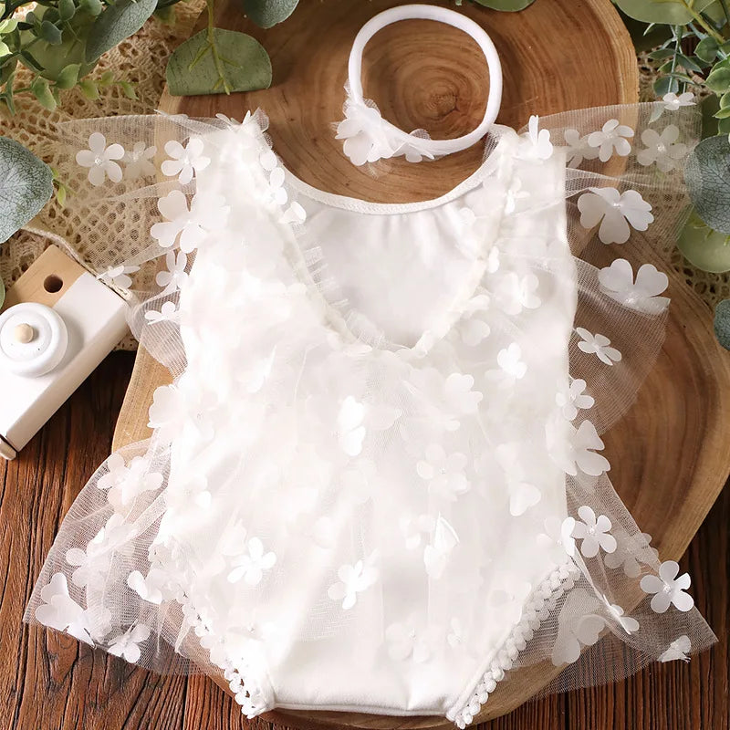 Infant girl's polyester floral romper with snap closure for easy changing