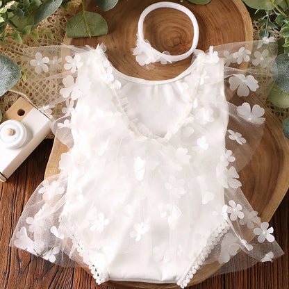 Infant girl's polyester floral romper with snap closure for easy changing