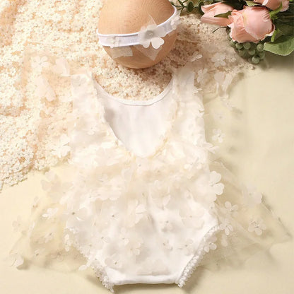 Delicate floral print baby romper and tie-back headband, perfect newborn gift