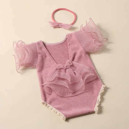 Yellow lace romper with matching bow headband, an adorable outfit for baby girl photo ops