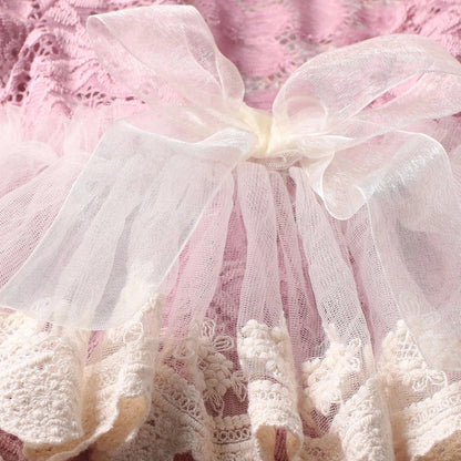 Elegant dusty pink lace romper and floral headband, a beautiful outfit for newborn girl photos