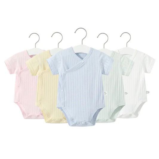 Newborn girl's 2-piece cotton romper set with short sleeves and v-neck, perfect for summer.