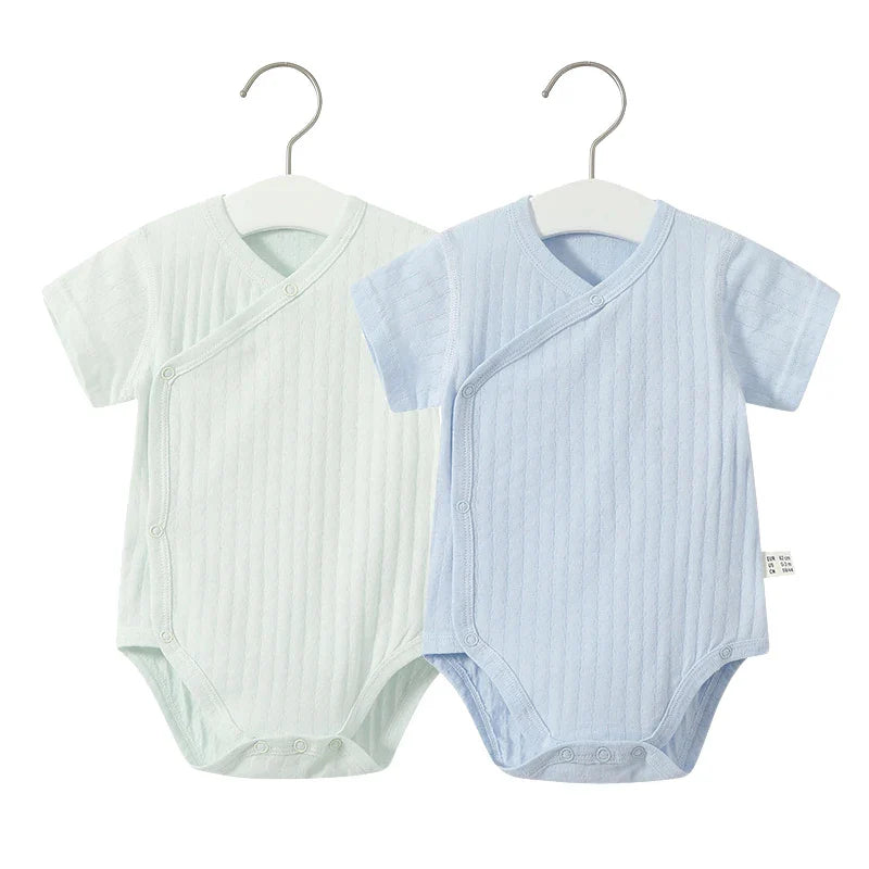 Breathable cotton short-sleeve romper, part of a 2-piece summer set for newborn girls.