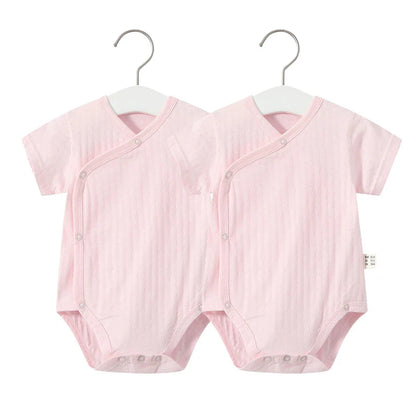 Newborn girl's comfy cotton romper and frilly shorts, a delightful summer baby fashion.