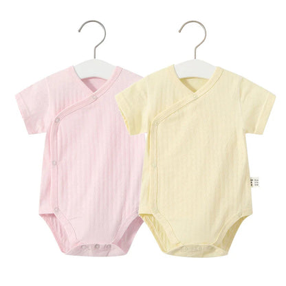 Charming baby girl's V-neck cotton romper, included in a 2-piece summer infant apparel set.