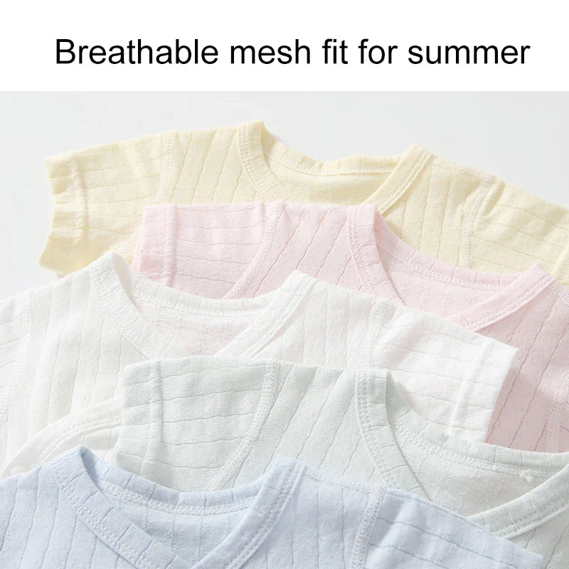 Pretty pink short-sleeve cotton romper for newborn girls, part of a comfy summer set.