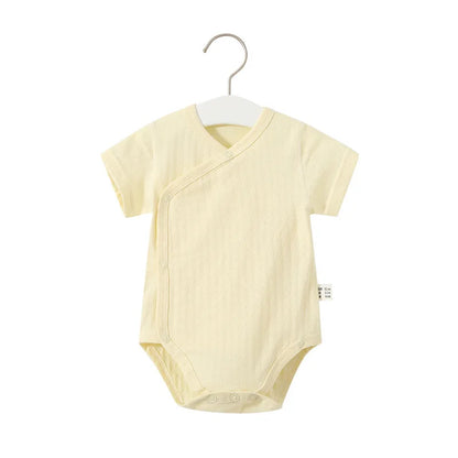 Newborn girl's fashion: v-neck cotton romper and bloomers set for a lovely summer look.
