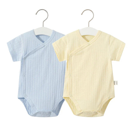 Light blue cotton romper and headband for newborn girls, a charming summer apparel set.