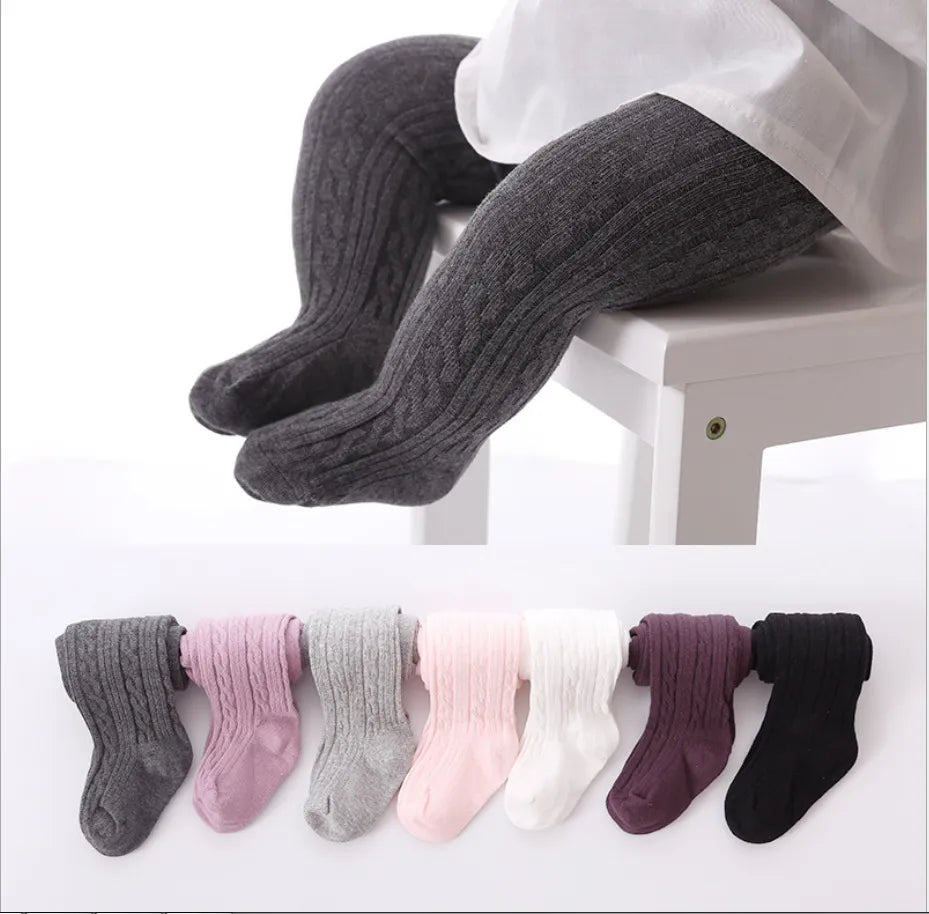 Assorted girls' breathable mesh ankle socks, spread out, showing range of colors and sizes