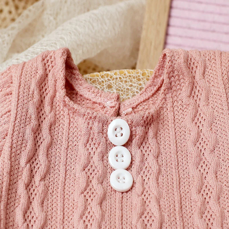 Baby clothing for photography: soft knit jumpsuit and pompom hat accessory