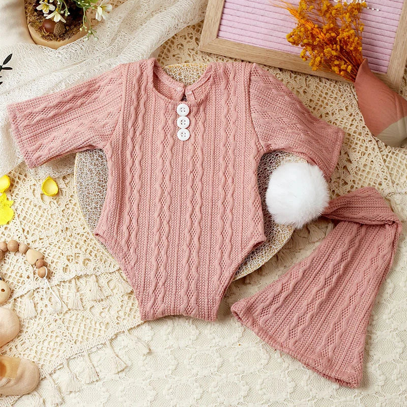Adorable baby boy outfit: knitted jumpsuit and pompom hat for photos