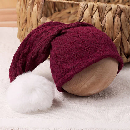 Hand-knitted newborn jumpsuit with pompom hat, professional photo prop
