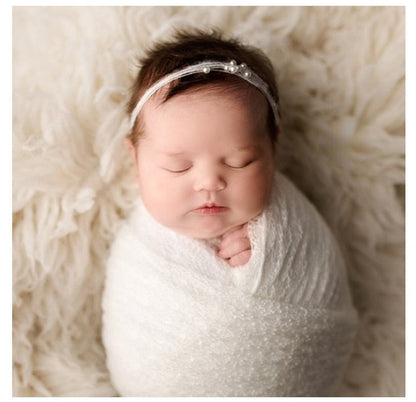 A cozy newborn mohair swaddle wrap and simple headband set in a natural tone, baby's first photos.