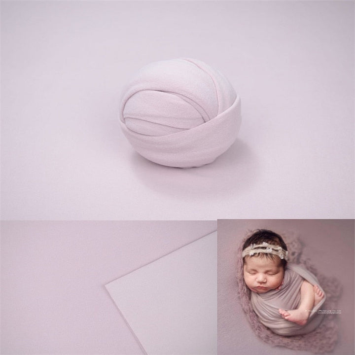 Cozy cotton newborn swaddle wrap for baby photography and a soft textured background blanket