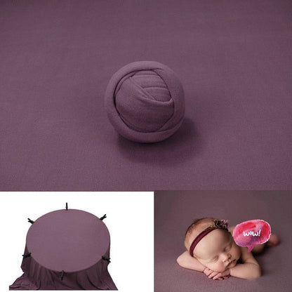 Baby photography set includes a cozy swaddle wrap and a neutral background blanket for newborns